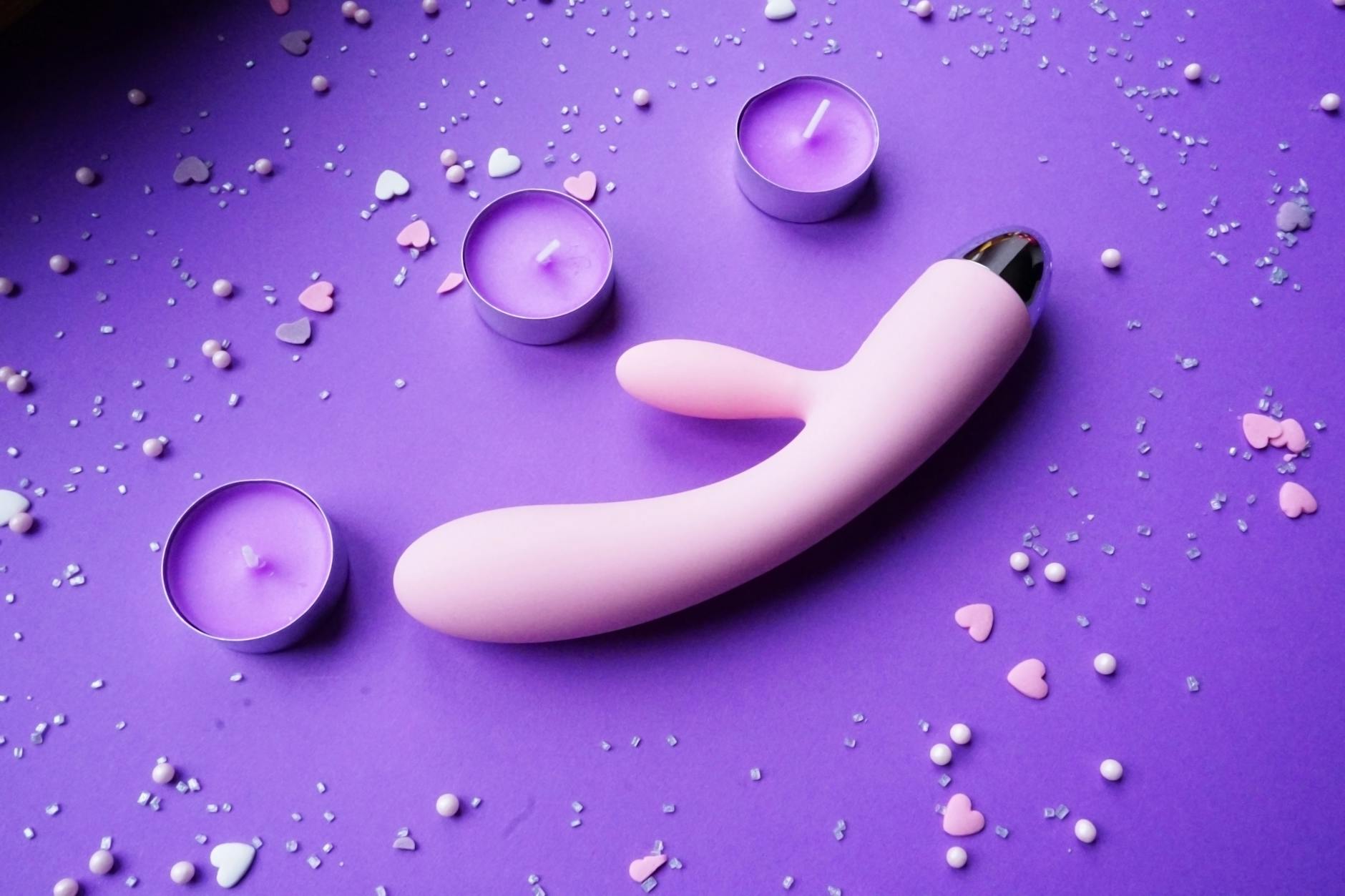 Vibrant lemon vibrators arranged on a bright yellow surface, showcasing diversity in design and color
